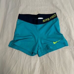 NIKE PRO Dri-Fit blue and green shorts